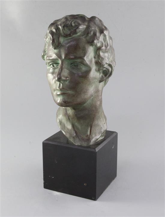 Victor Joseph Ghislain Demanet (1895-1964). A bronze head study of a young man, 14in.